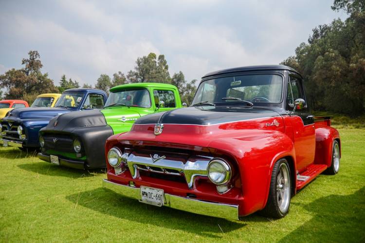 A classic and retro Ford pickup in a vintage vehicle event.